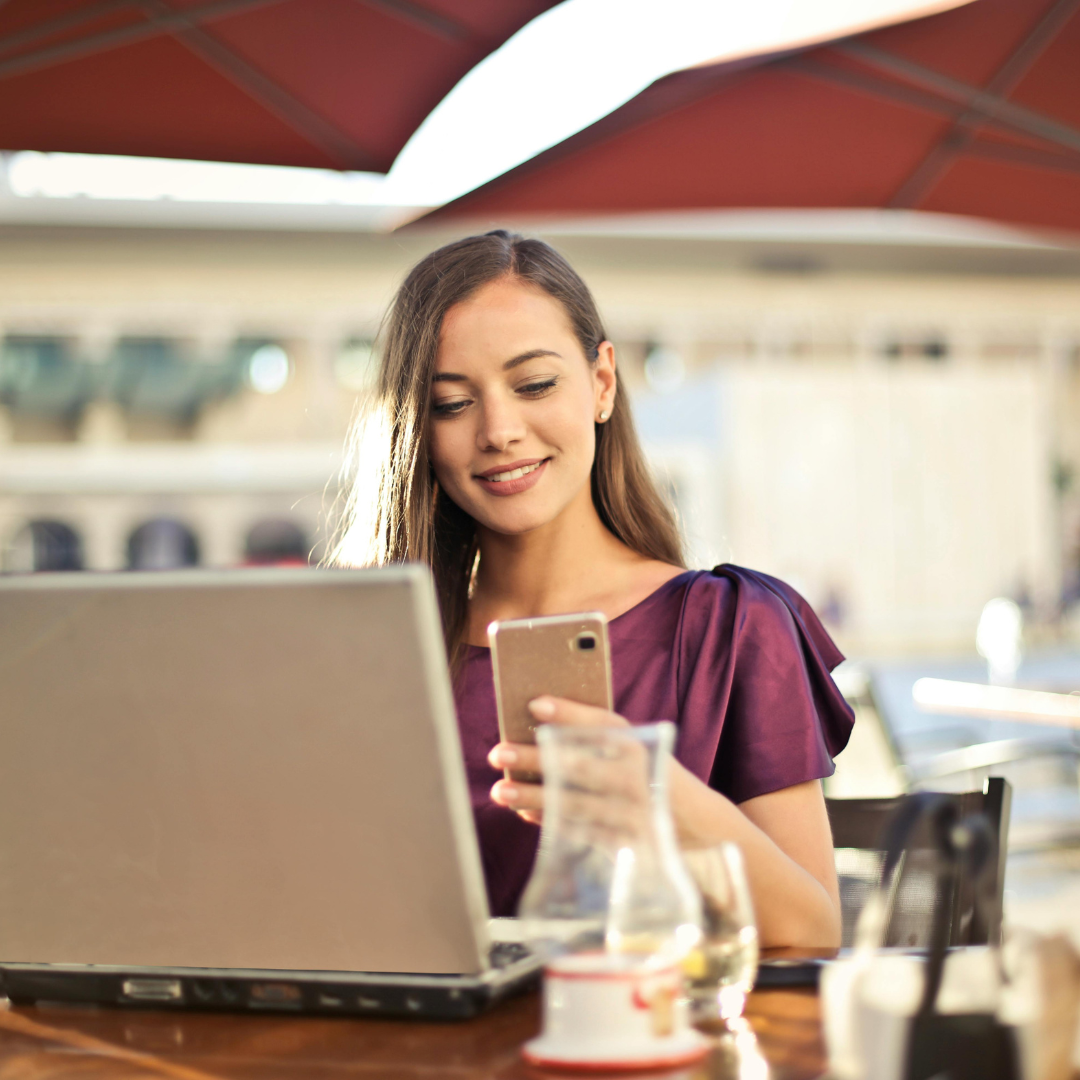 A woman looking at her phone